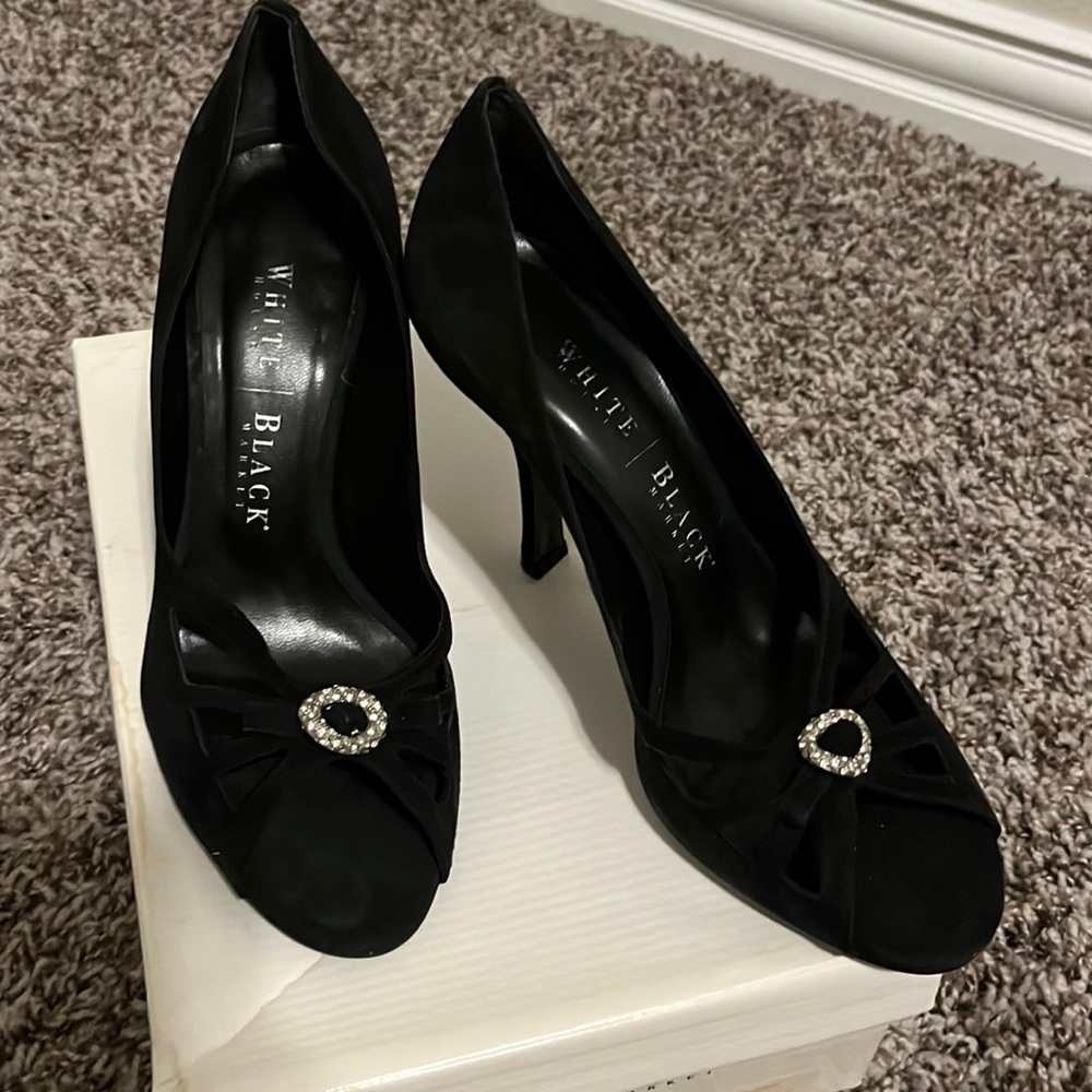 New White House Black Market black suede heals with rhinestone accent. Size 7.